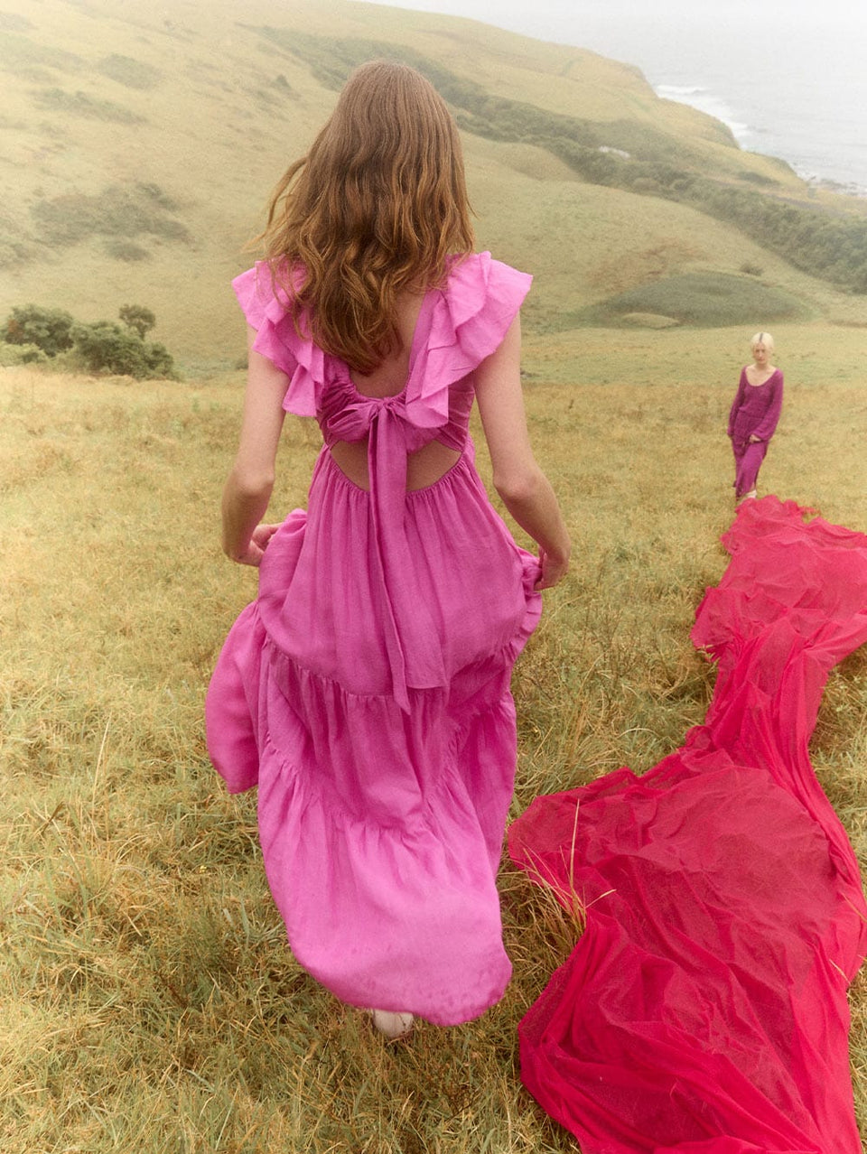 Millie Maxi Dress KIVARI | Model wears pink frilled maxi dress campaign