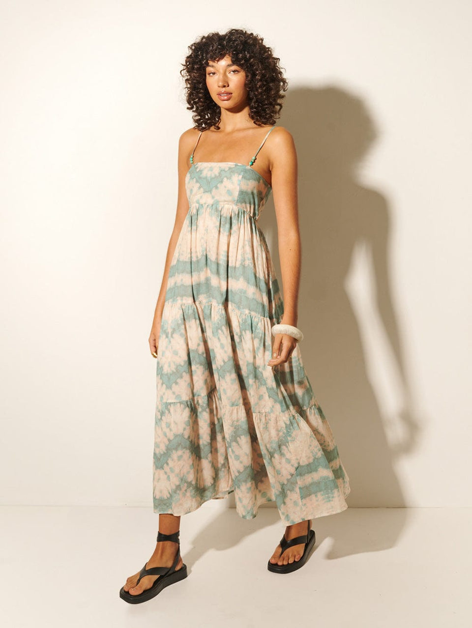 Mirage Maxi Dress KIVARI | Model wears tie dye maxi dress side view