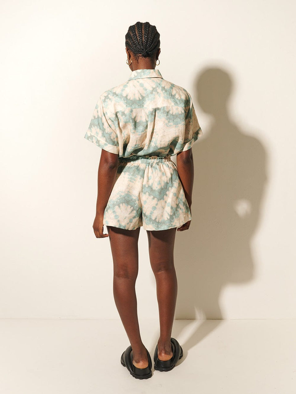 Mirage Short KIVARI | Model wears tie dye shorts with matching top back view
