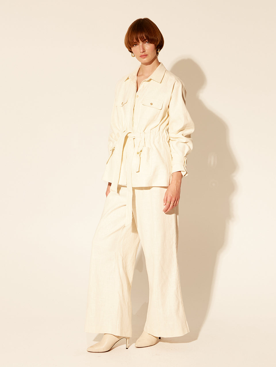 Oaklee Jacket Cream KIVARI | Model wears cream jacket side view