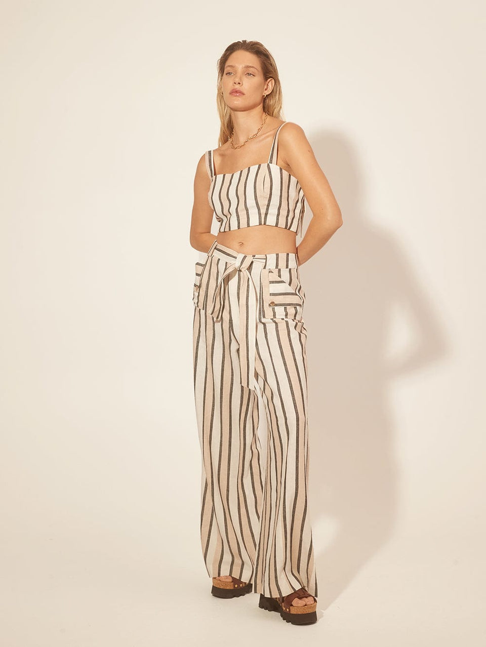 Oaklee Pant KIVARI | Model wears stripe pant side view