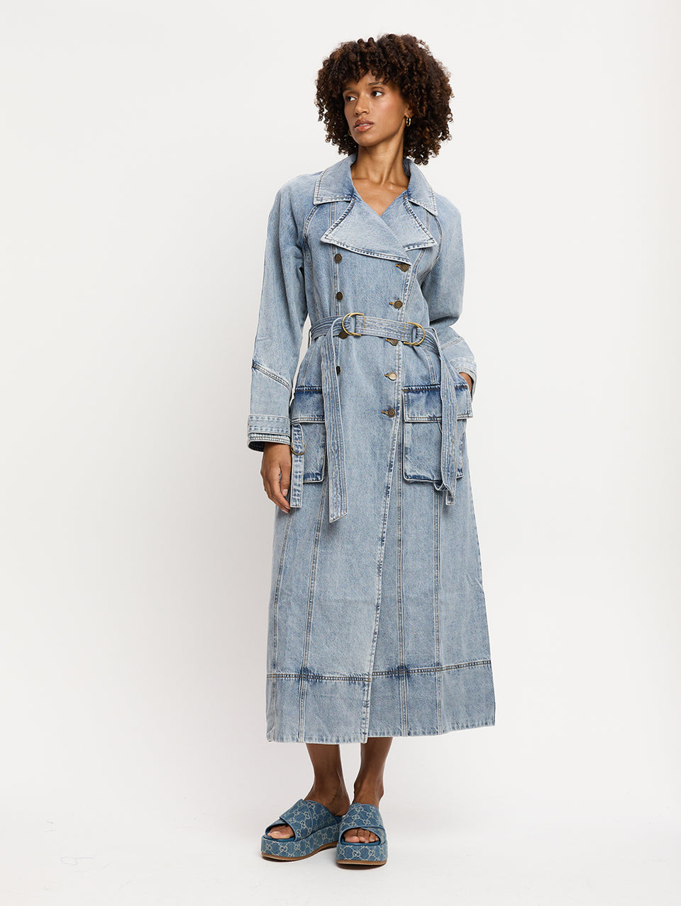 Olivia Denim Trench Coat KIVARI | Model wears light blue wash denim trench coat