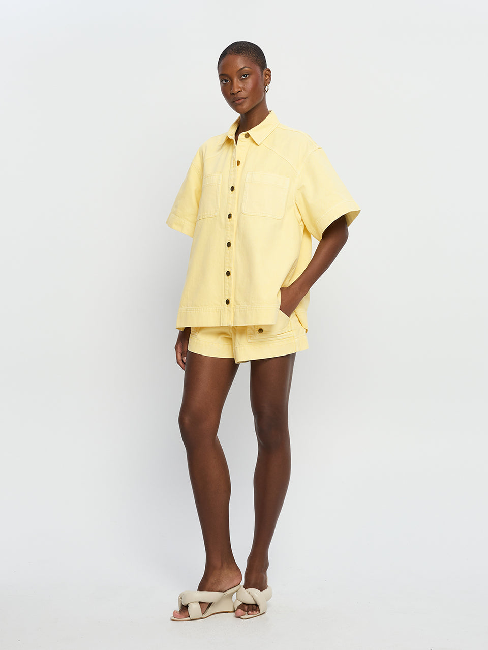 Paloma Shirt Butter | Model wears yellow denim shirt side view