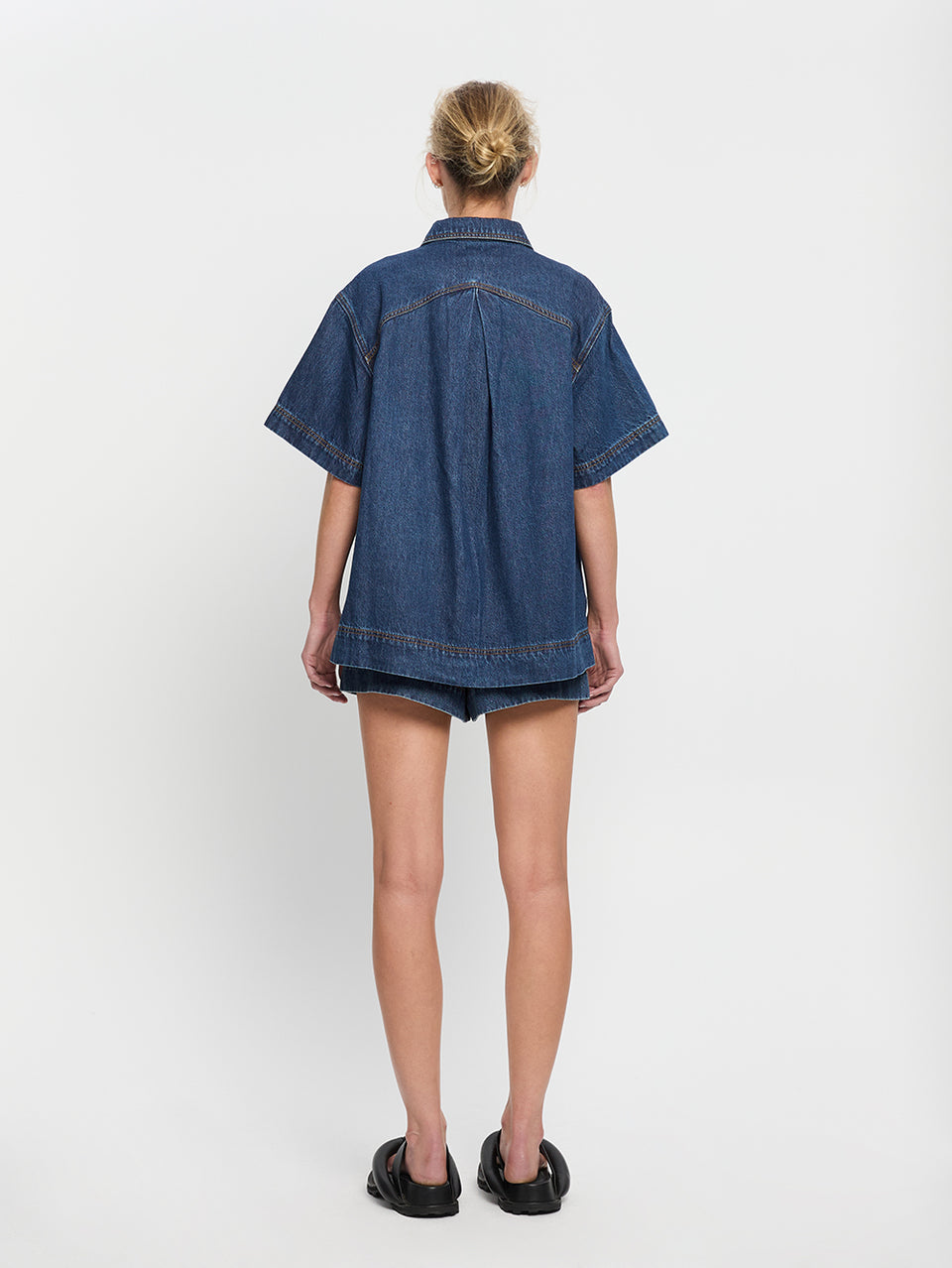 Paloma Shirt Indigo KIVARI | Model wears indigo denim shirt back view