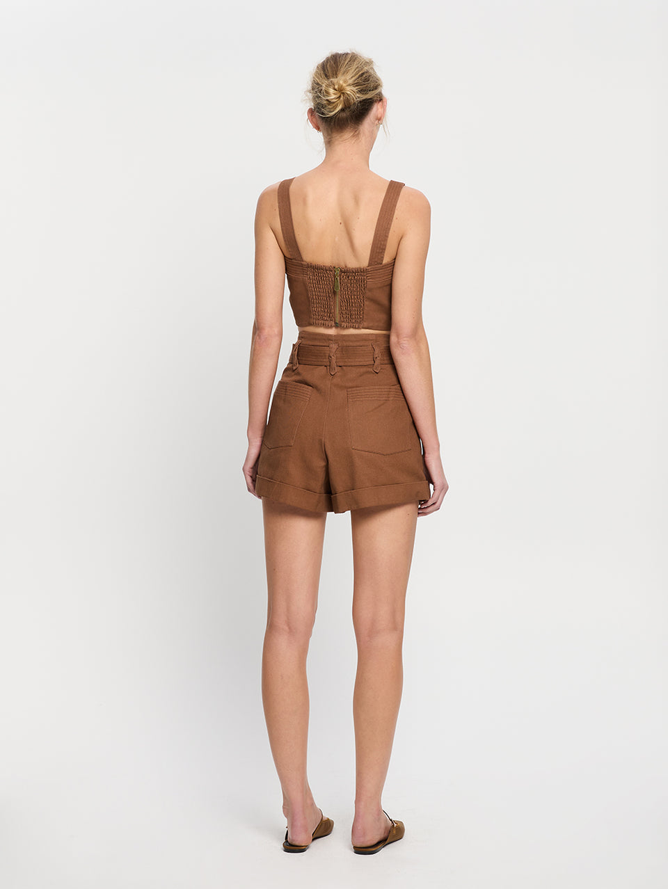 Pearla Top KIVARI | Model wears brown crop top back view