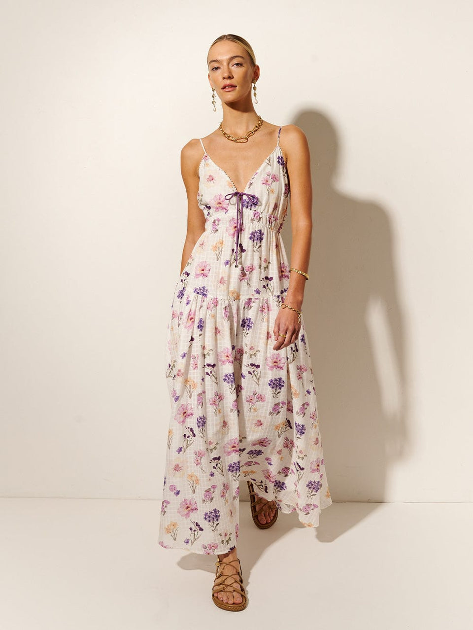 Phoebe Maxi Dress KIVARI | Model wears ivory and purple floral maxi dress