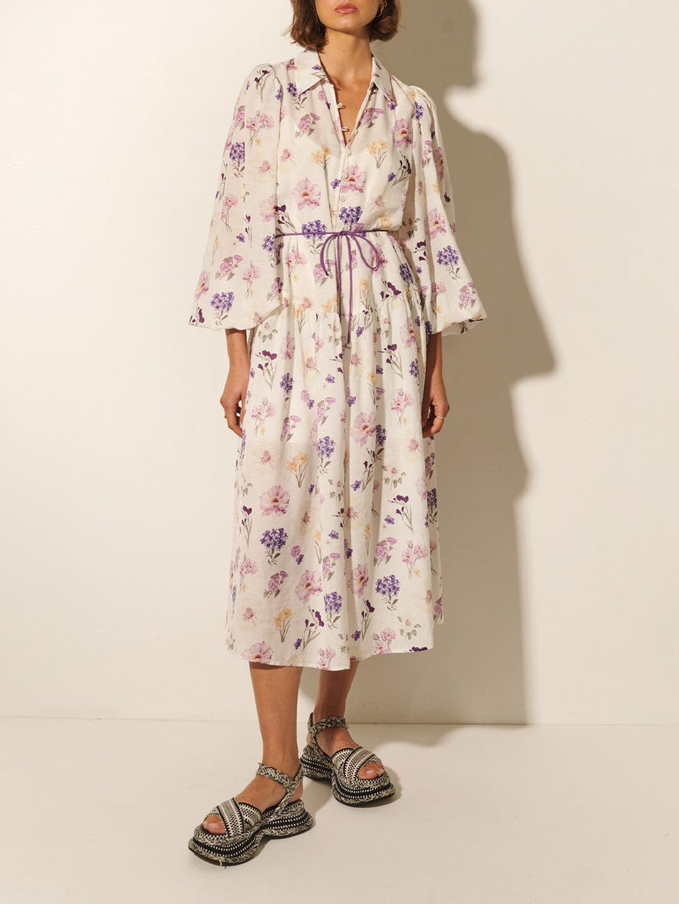 Phoebe Midi Dress KIVARI | Model wears ivory and purple floral midi dress