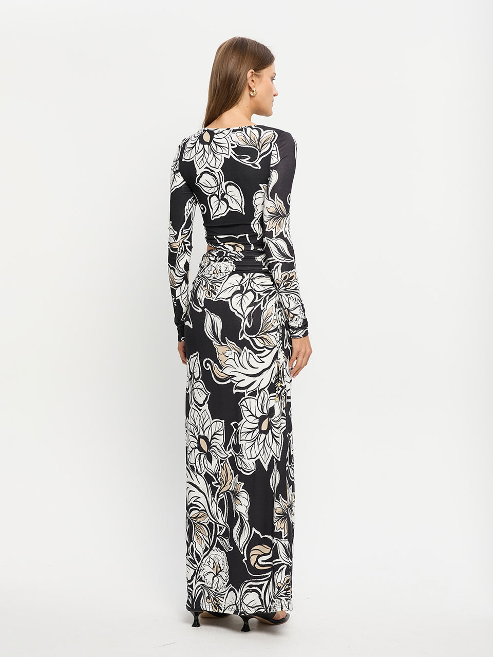 Alma Knit Maxi Dress KIVARI | Model wears black and white floral maxi dress 