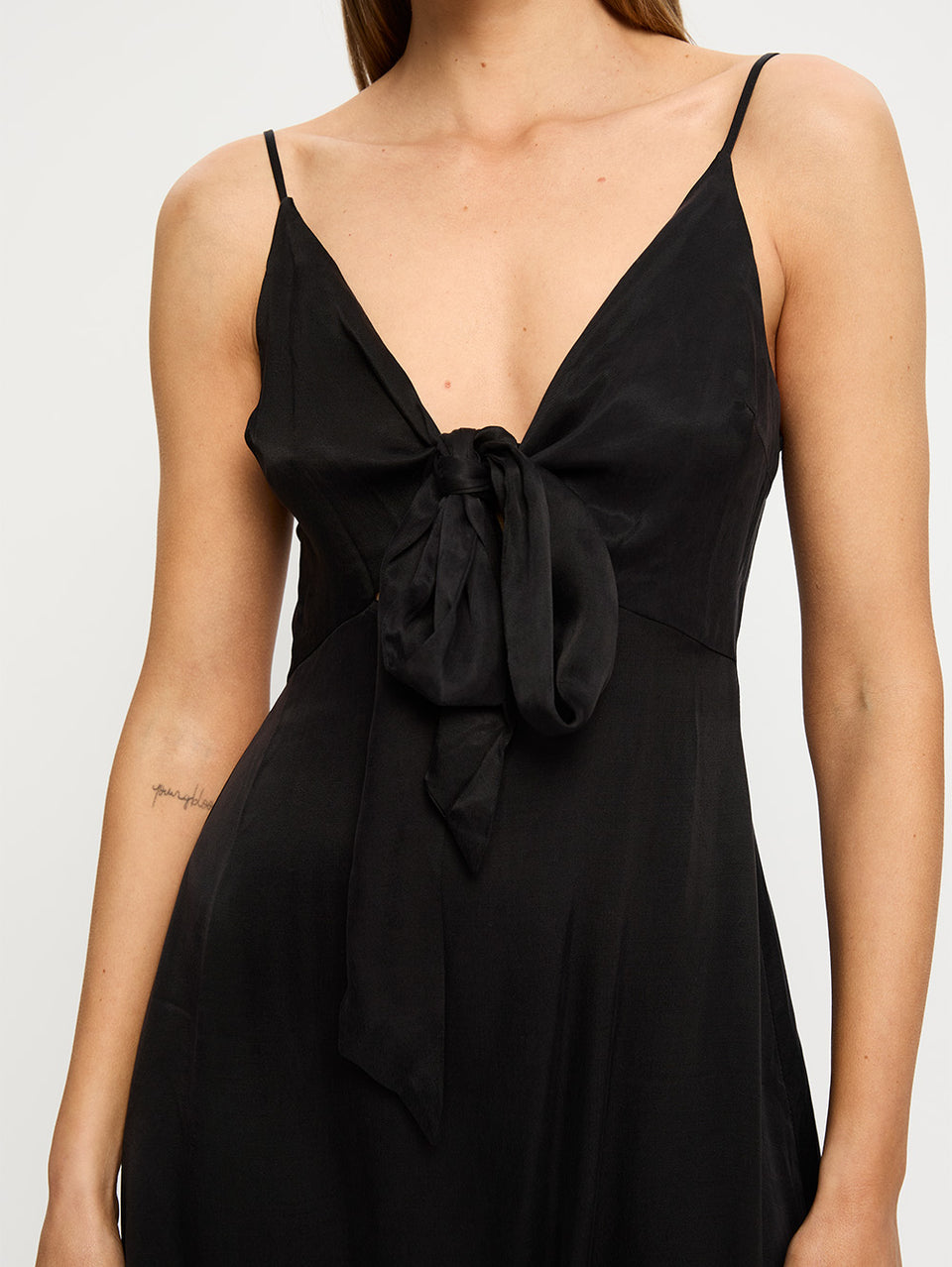 KIVARI Bianca Tie Front Mini Dress | Model wears Black Tie Front Mini Dress