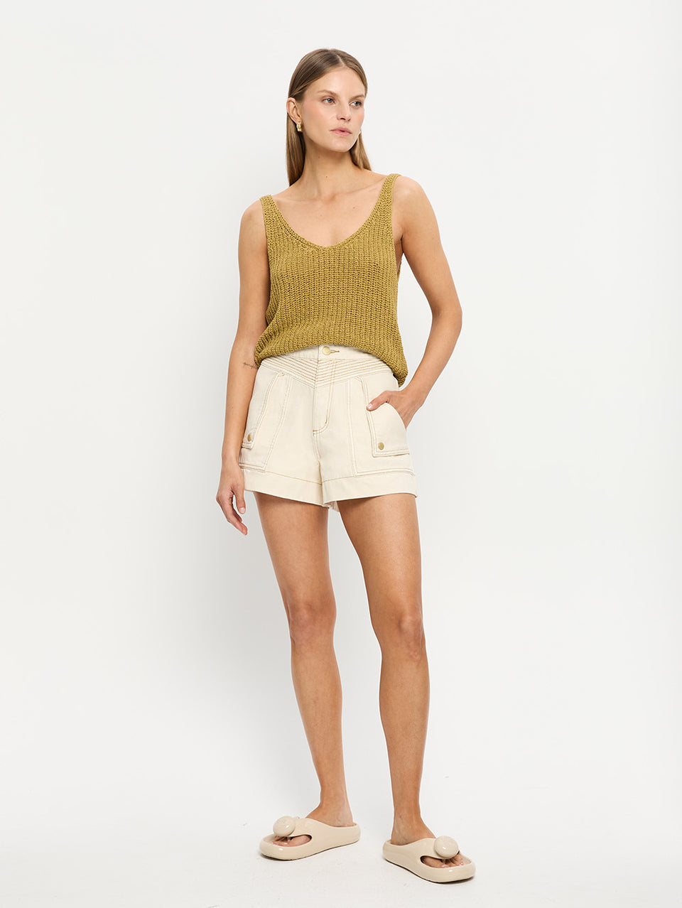 Celene Denim Short - Cream | Model wearing cream shorts with khaki knit cami