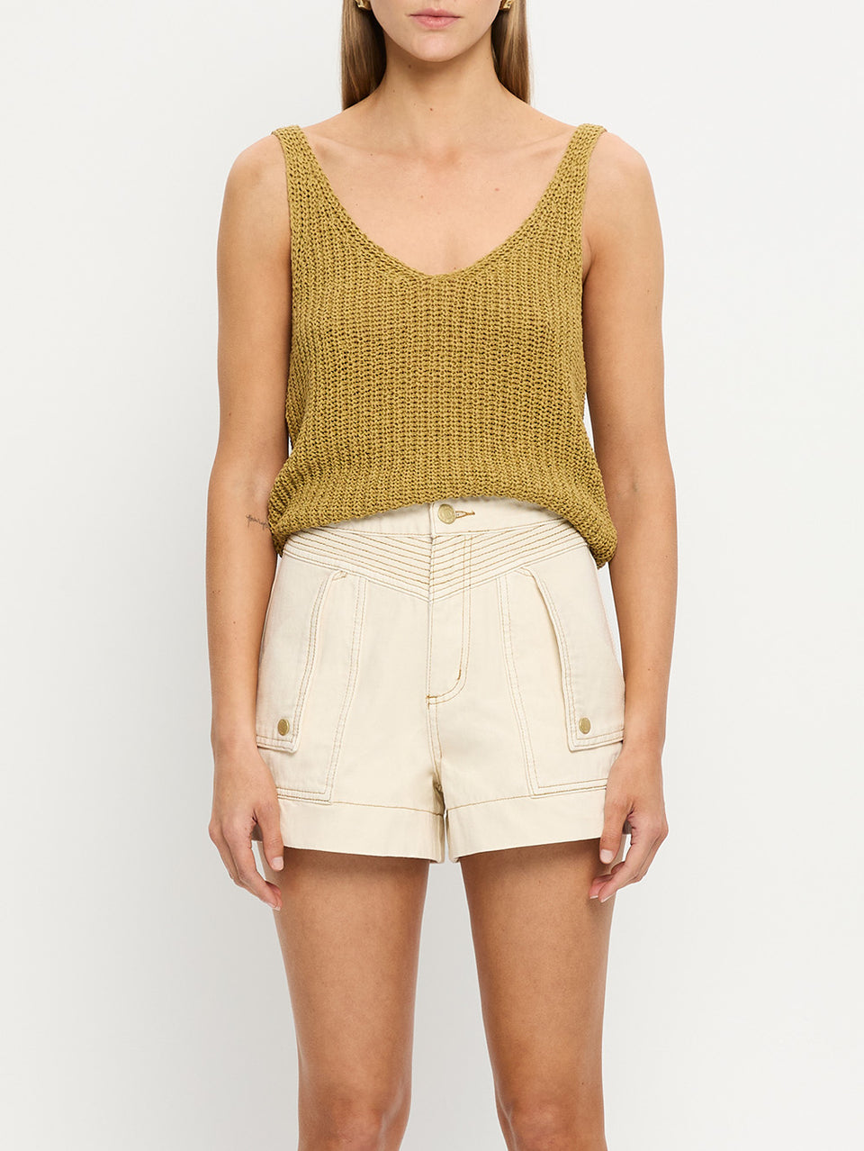 Celene Denim Short - Cream | Model wearing cream shorts with khaki knit cami