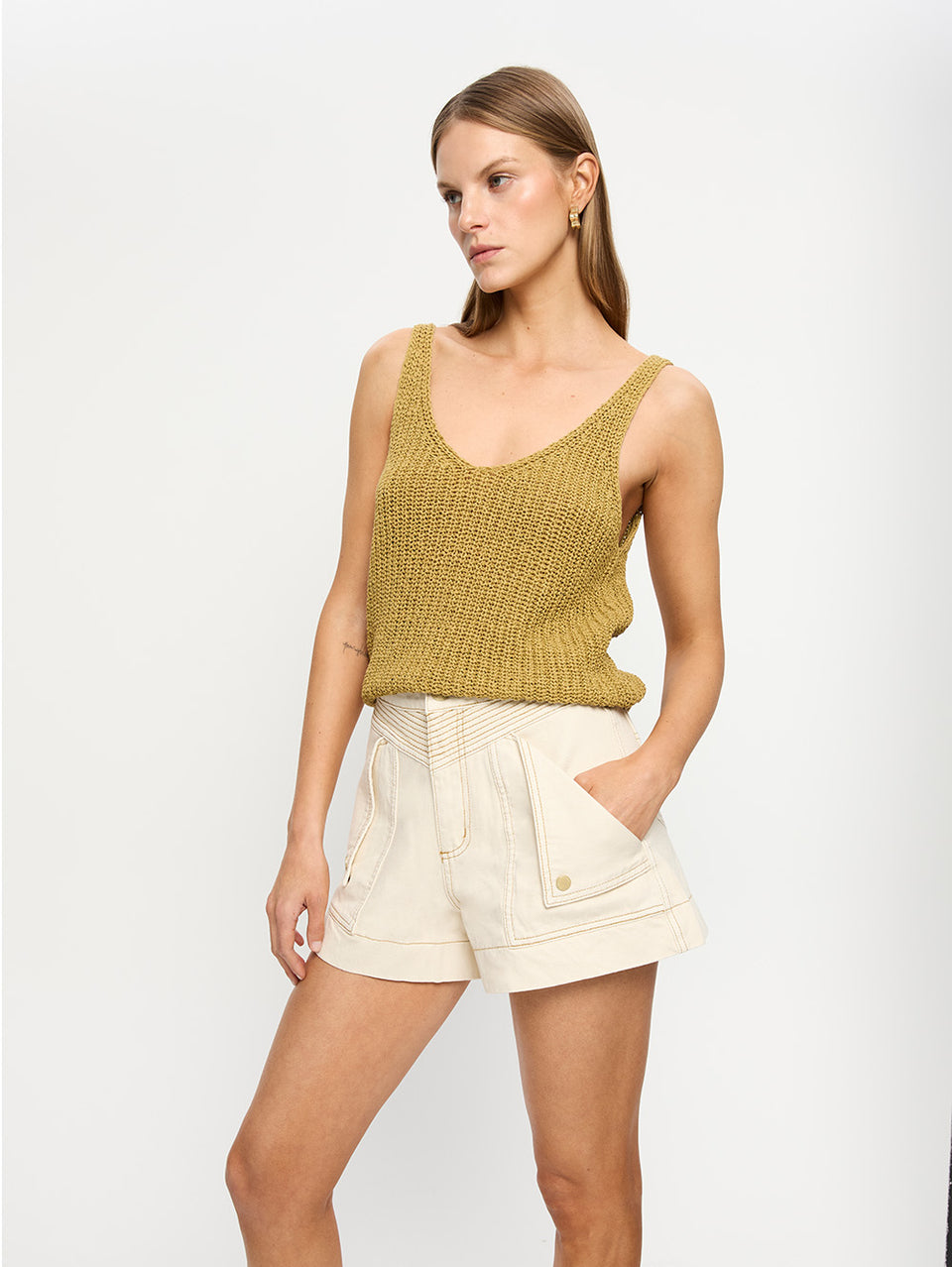 Celene Denim Short - Cream | Model wearing cream shorts with khaki knit cami