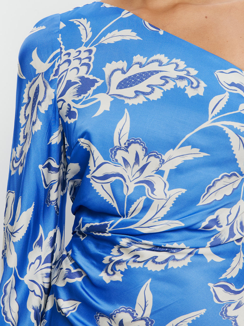 Blue dress with white floral pattern on a person