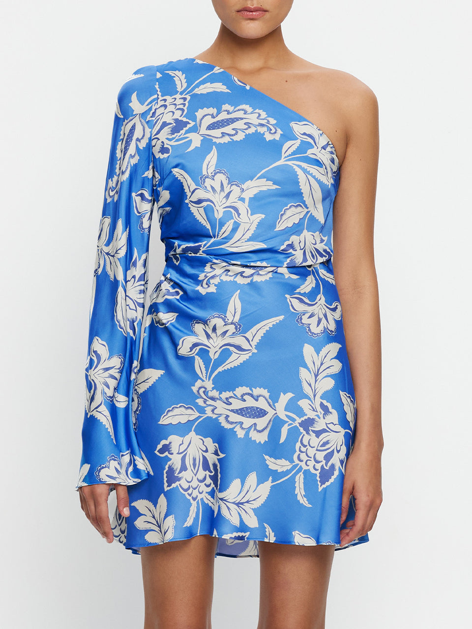 Blue floral one-shoulder dress on a white background