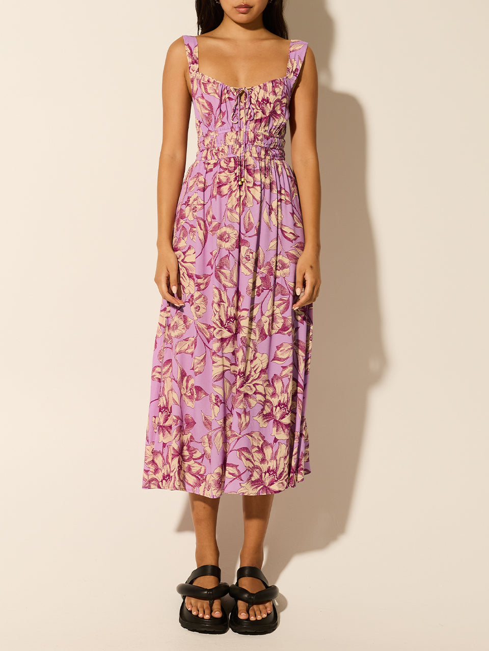 Reyna Strappy Midi Dress KIVARI | Model wears purple floral strappy midi dress