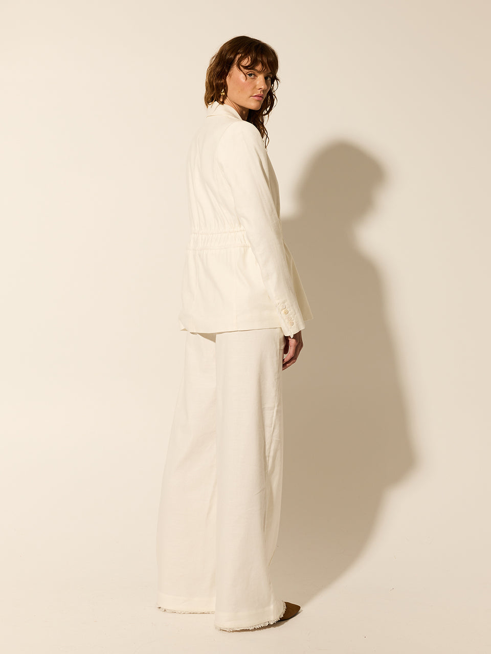 Rocio Jacket KIVARI | Model wears cream tailored jacket back view