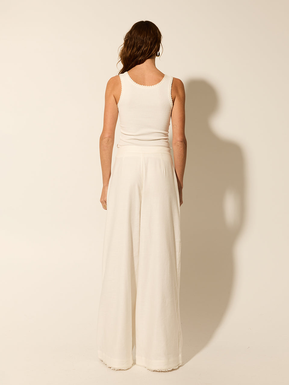 Rocio Pant KIVARI | Model wears cream tailored pant back view