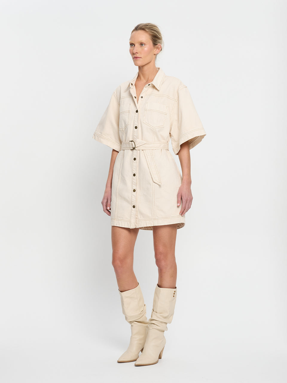 Rowyn Shirt Dress Cream KIVARI | Model wears cream denim shirt dress side view