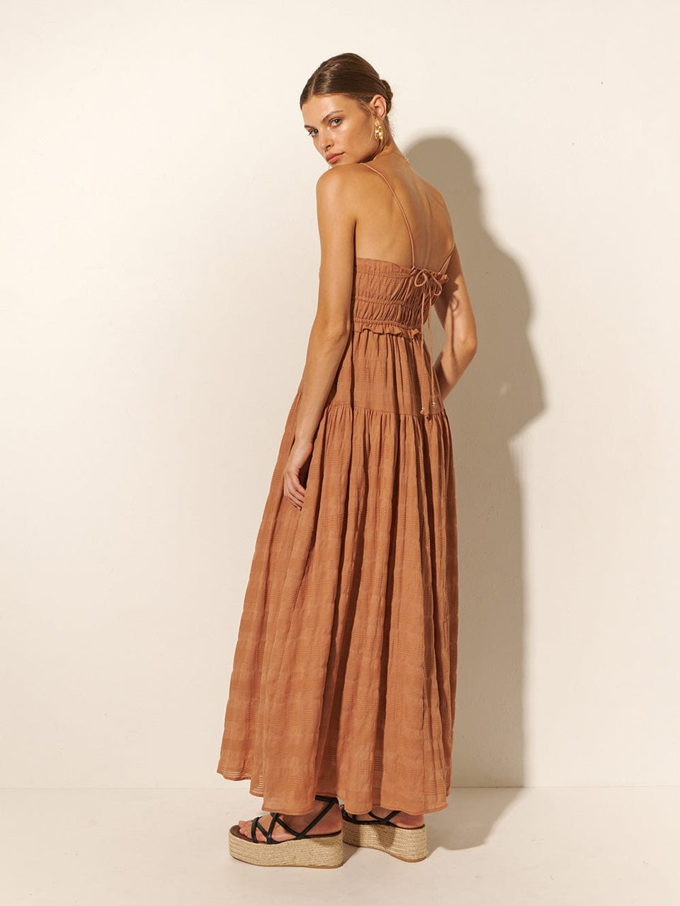 KIVARI Rylan Maxi Dress | Model wears Brown Maxi Dress Back View