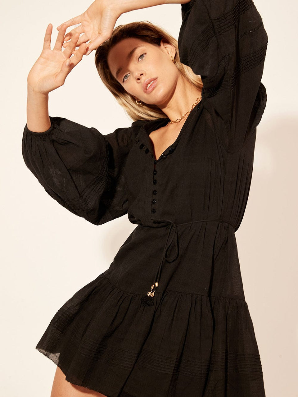 KIVARI Xanthe Babydoll Mini Dress | Model wears Black Mini Dress Close Up