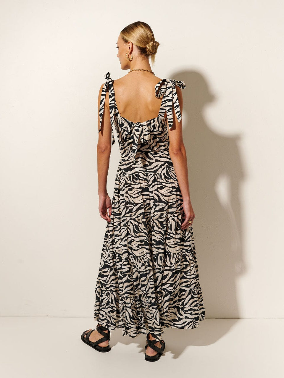 Zenya Maxi Dress KIVARI | Model wears Zebra printed maxi dress back view