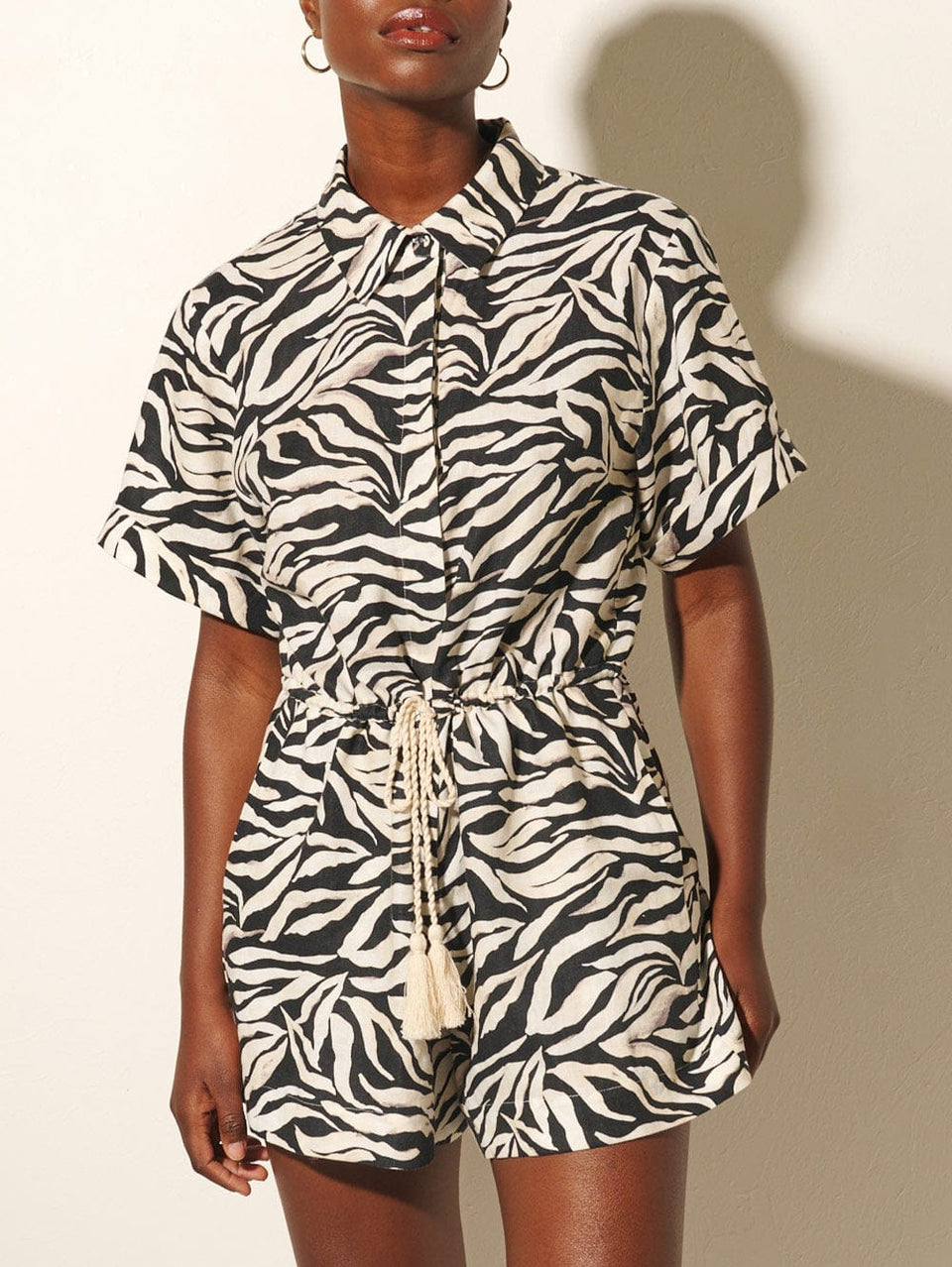 Zenya Playsuit KIVARI | Model wears zebra printed playsuit close up